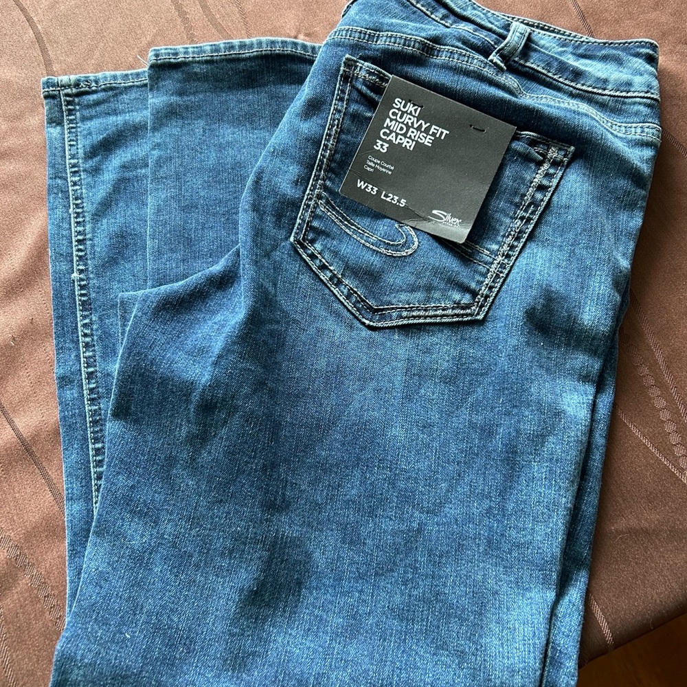 Size 33 silver capris brand new